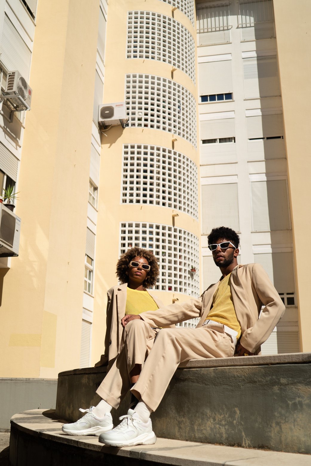 Man and Woman in Monotone Pastel Outfits