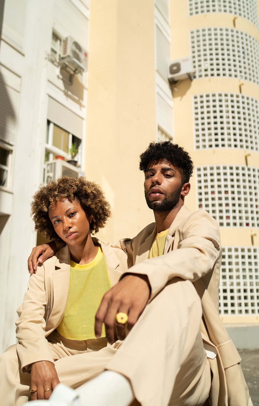 Man and Woman in Monotone Pastel Outfits