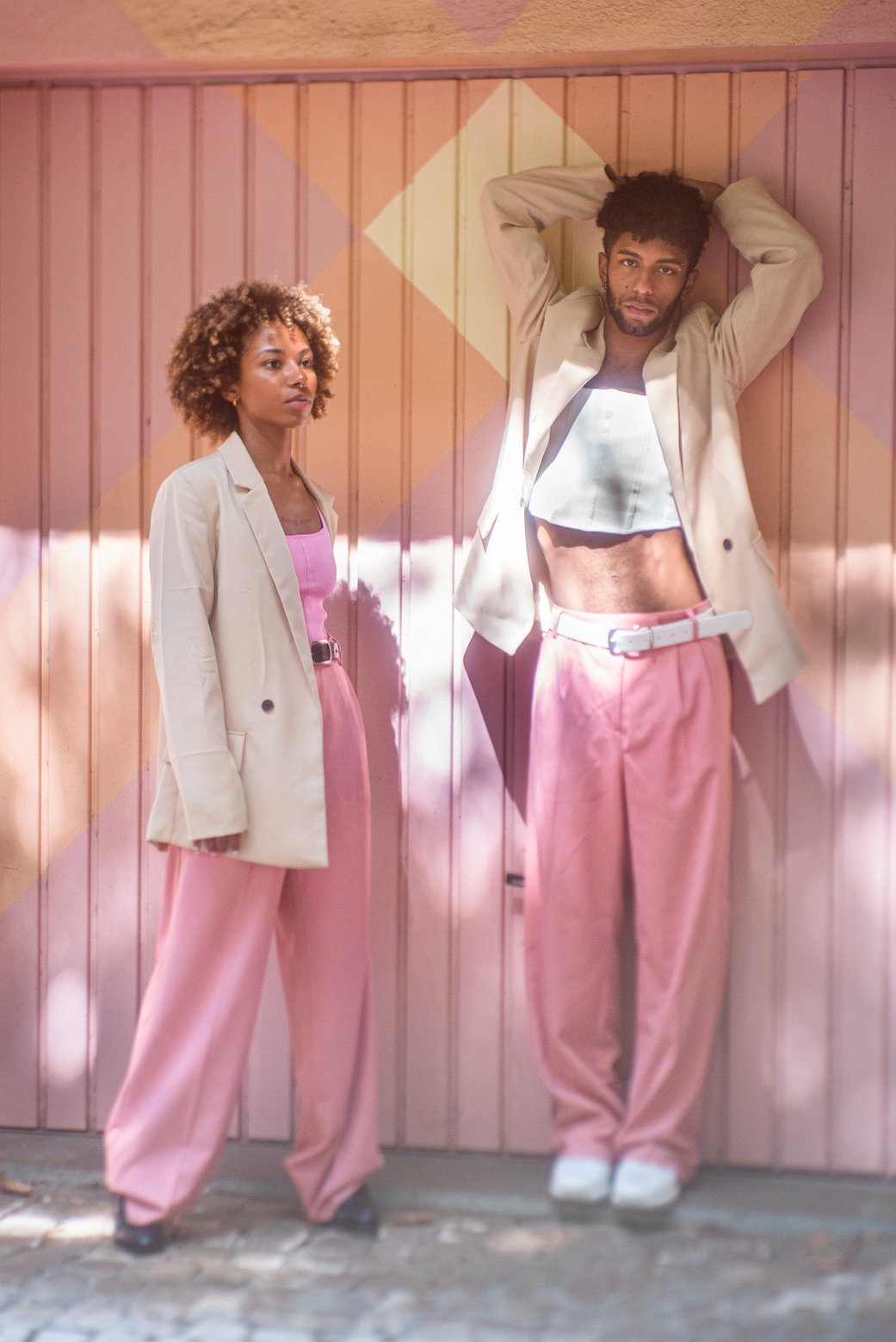 Man and Woman in Monotone Pastel Outfits