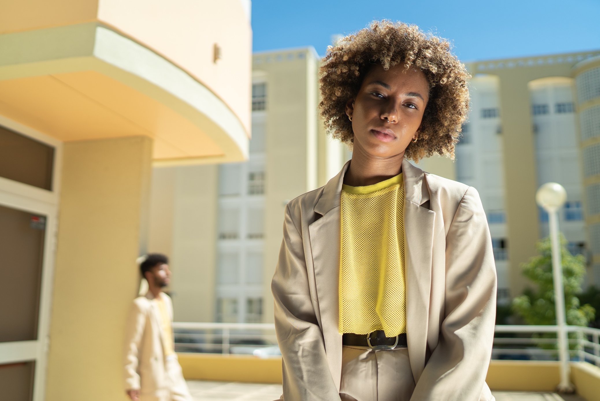 Man and Woman in Monotone Pastel Outfits